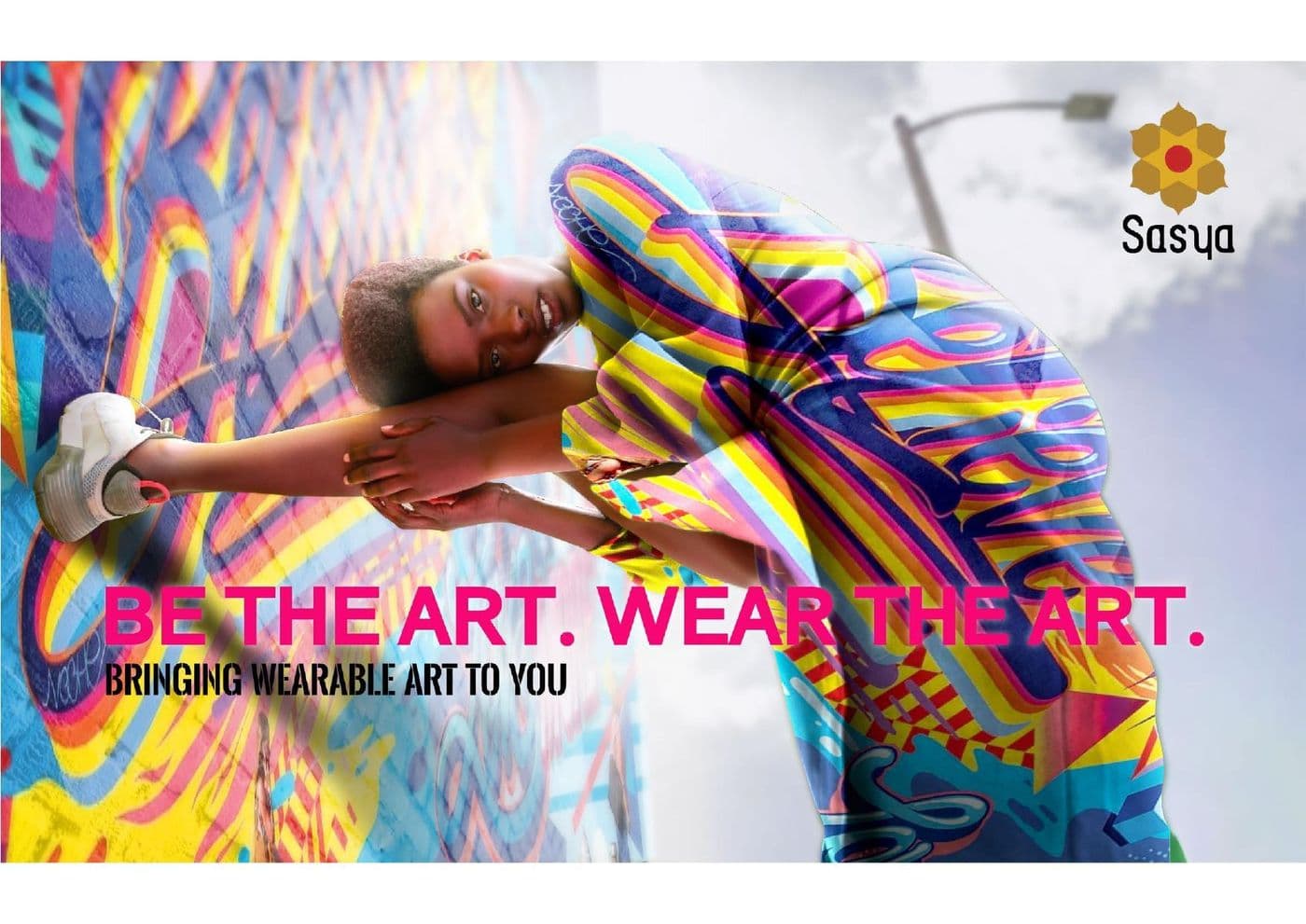 Sasya campaign key visual with a model posed against a matching printed backdrop