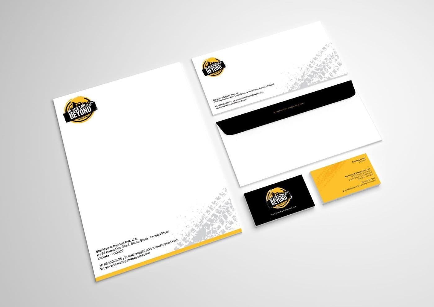 A corporate stationery suite with letterhead, envelope and business cards